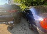 В Рязани автоледи на «Рено» протаранила две припаркованные машины